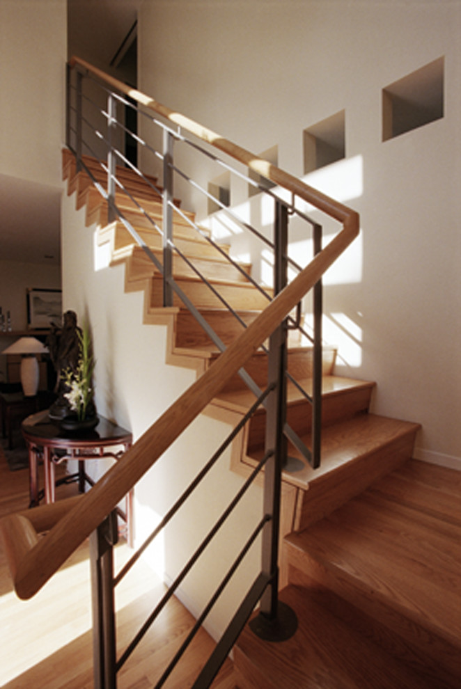 Inspiration for a mid-sized midcentury wood l-shaped staircase in Burlington with wood risers.