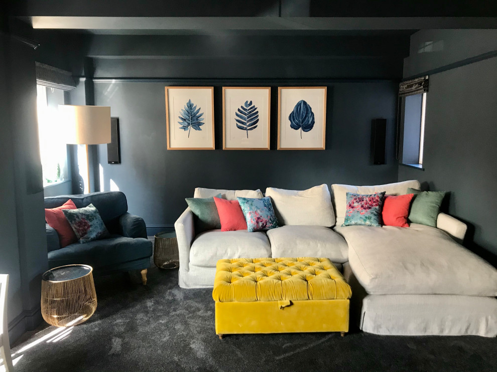 Foto di un soggiorno minimal di medie dimensioni e chiuso con pareti blu, moquette e pavimento grigio
