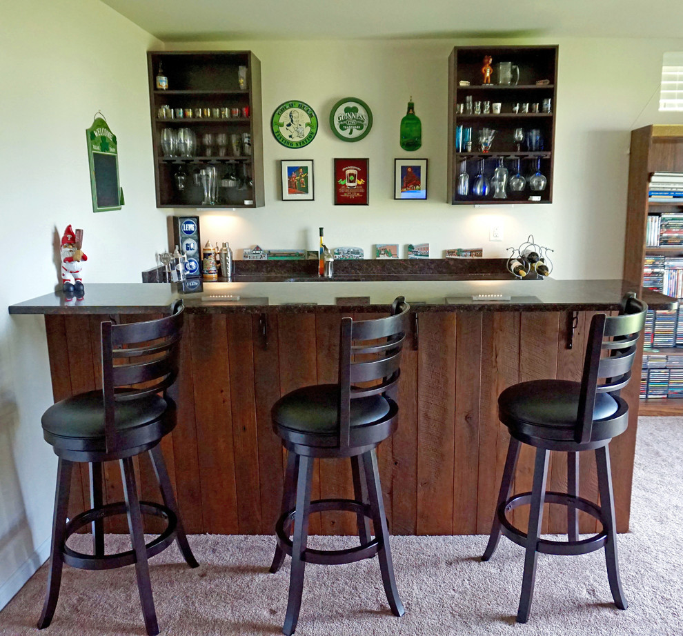 This is an example of a small arts and crafts galley home bar in Baltimore with an undermount sink, open cabinets, black cabinets, granite benchtops and ceramic floors.