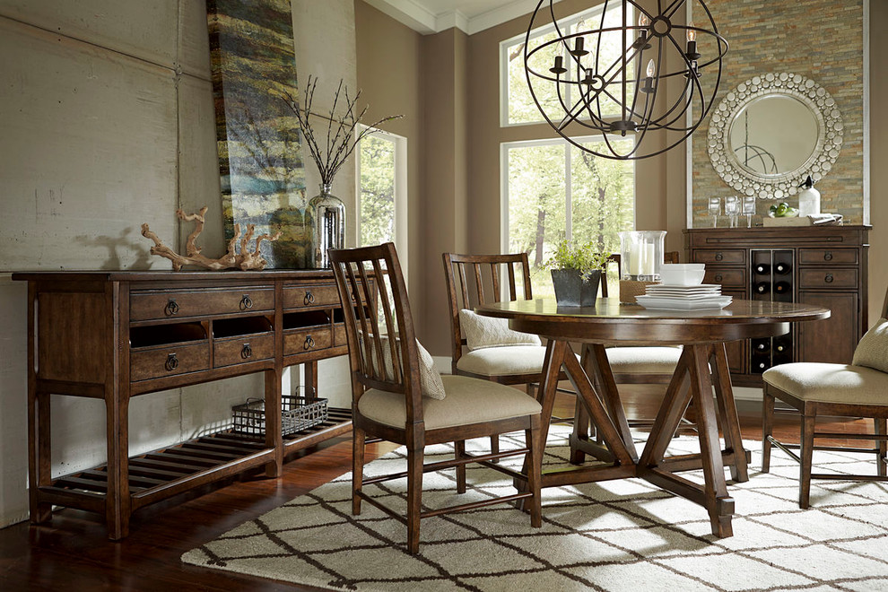 Design ideas for a mid-sized traditional open plan dining in Charlotte with beige walls and medium hardwood floors.