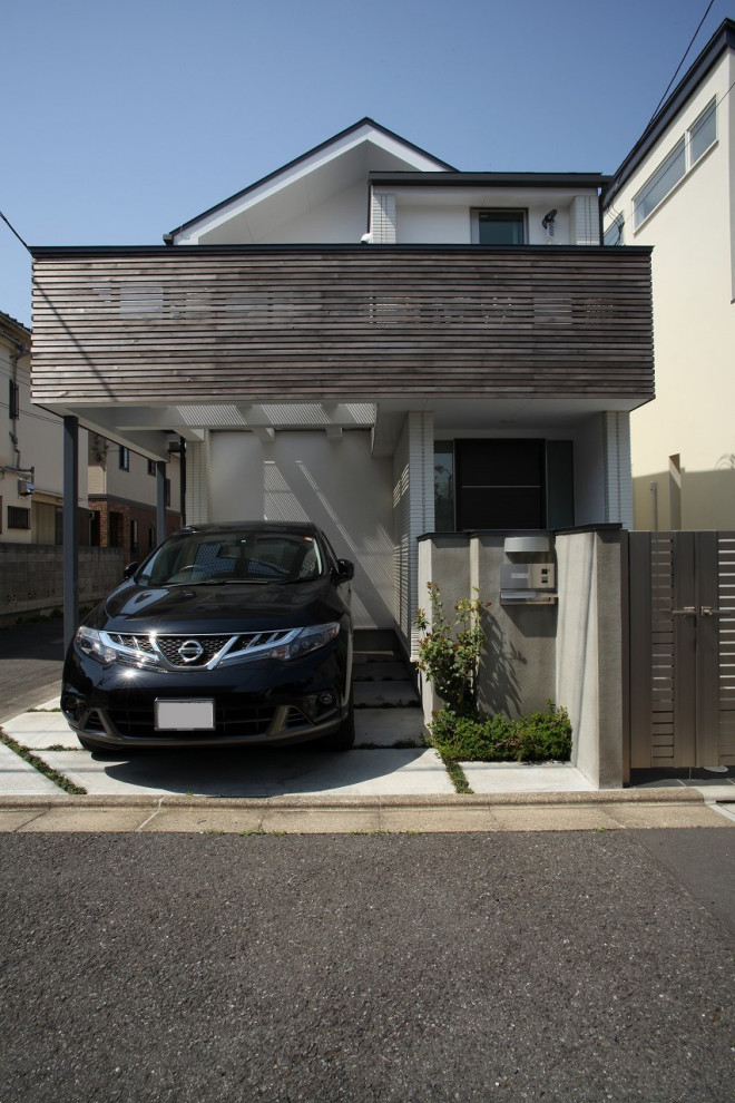 Inspiration for a mid-sized modern garage in Tokyo.