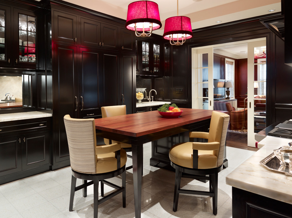 Inspiration for a traditional separate kitchen in Chicago with recessed-panel cabinets.