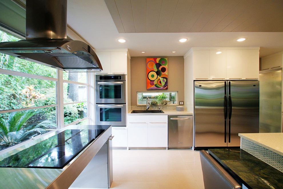 This is an example of a midcentury kitchen in Dallas.