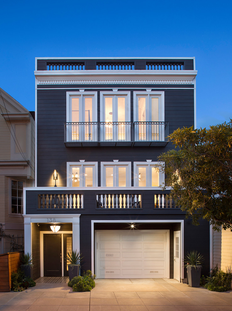 Photo of a large transitional three-storey house exterior in San Francisco.