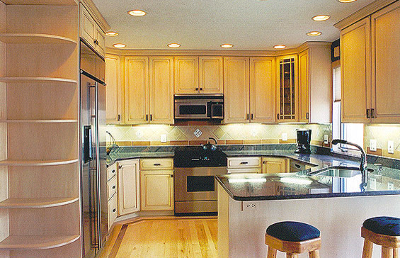 Kitchen - large light wood floor kitchen idea in DC Metro with a single-bowl sink, light wood cabinets, granite countertops, beige backsplash and stainless steel appliances