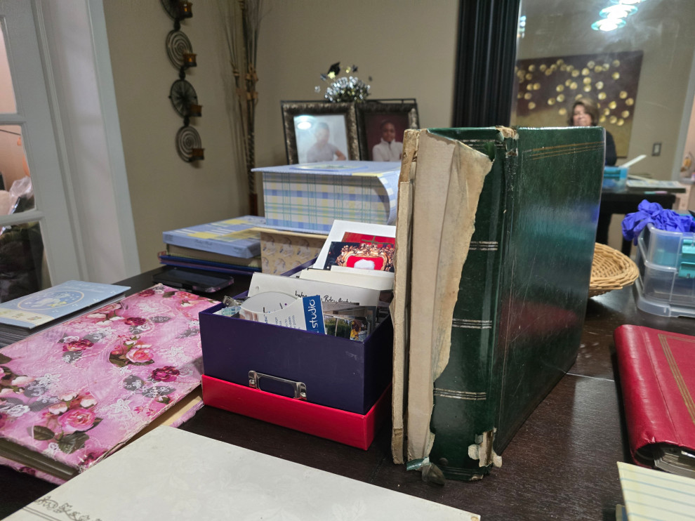 Photo boxes on table to be organized