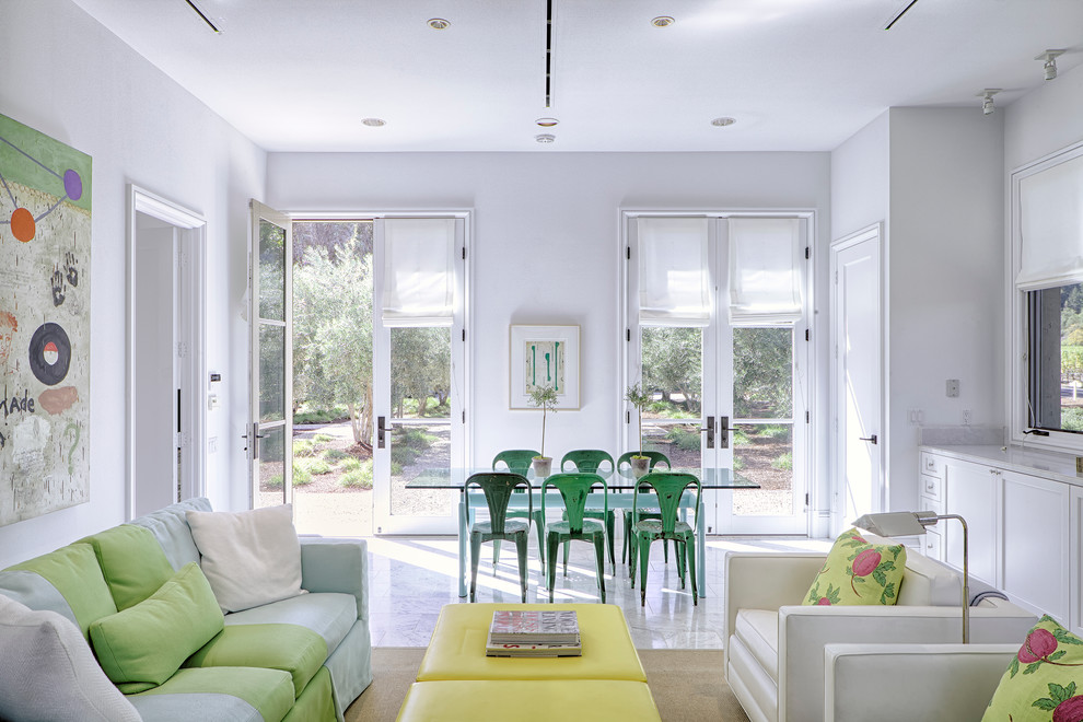 Photo of a transitional open concept living room in San Francisco with white walls.