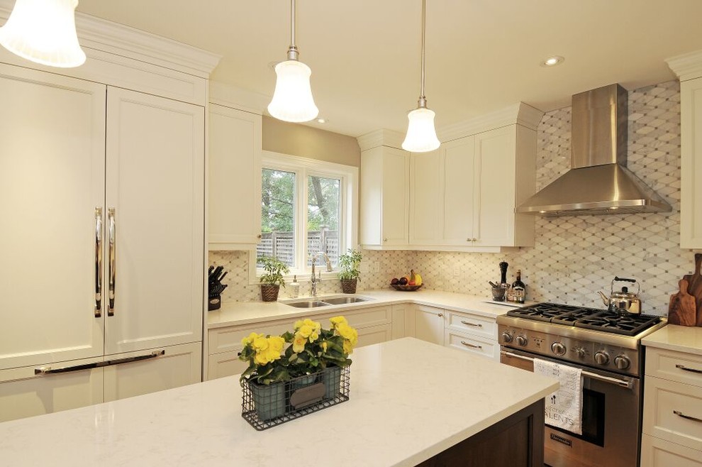 Inspiration for a mid-sized transitional l-shaped medium tone wood floor kitchen remodel in Ottawa with a double-bowl sink, recessed-panel cabinets, white cabinets, quartz countertops, gray backsplash, stone tile backsplash, stainless steel appliances and an island