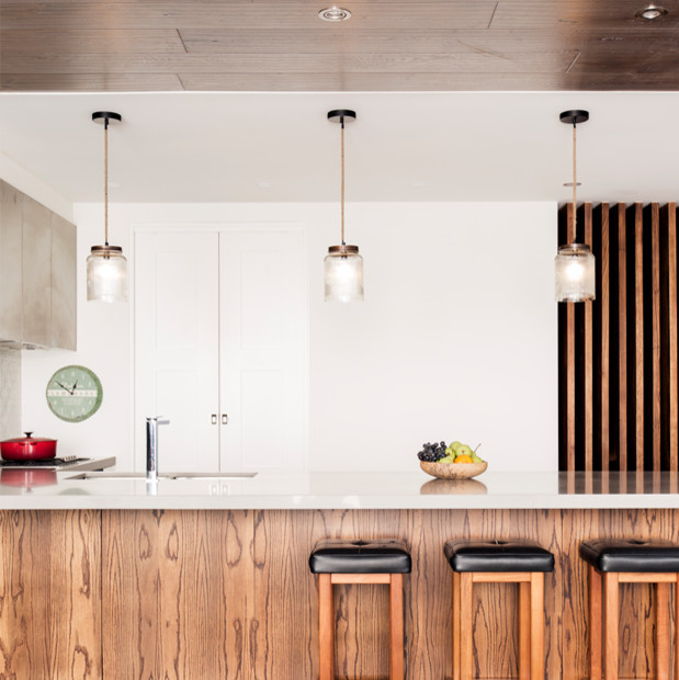 Photo of a small contemporary l-shaped open plan kitchen in Melbourne with with island.