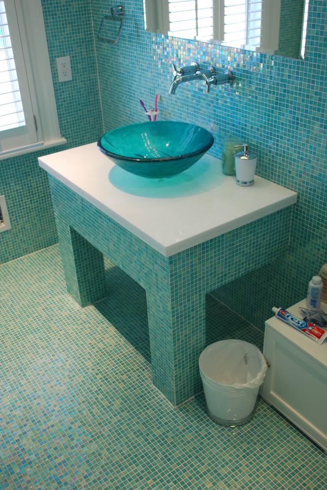 Design ideas for an eclectic bathroom in New York with tile benchtops, multi-coloured tile, mosaic tile and mosaic tile floors.