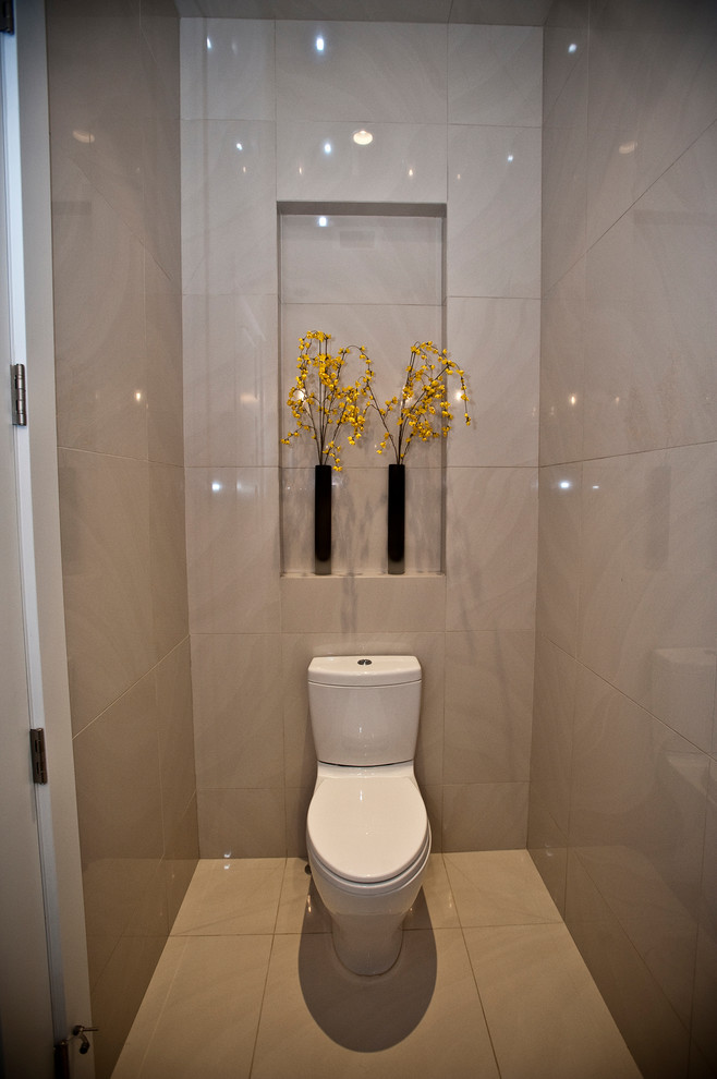 Large contemporary powder room in Other with open cabinets, black cabinets, beige tile, travertine, beige walls, medium hardwood floors, a vessel sink, engineered quartz benchtops, brown floor and a one-piece toilet.