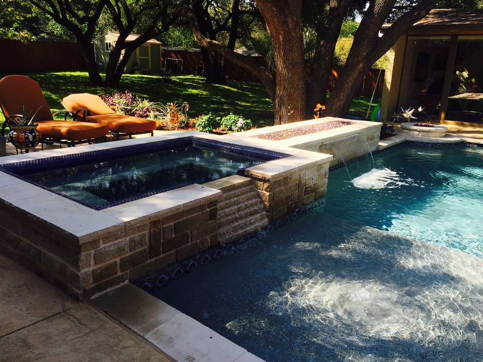 Small transitional backyard stamped concrete and rectangular lap hot tub photo in Dallas
