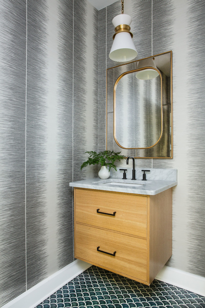 Inspiration for a modern powder room in Other with flat-panel cabinets, light wood cabinets, mosaic tile floors, an undermount sink, marble benchtops, turquoise floor and grey benchtops.