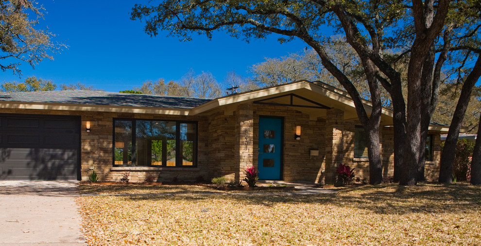 Photo of a contemporary home design in Austin.