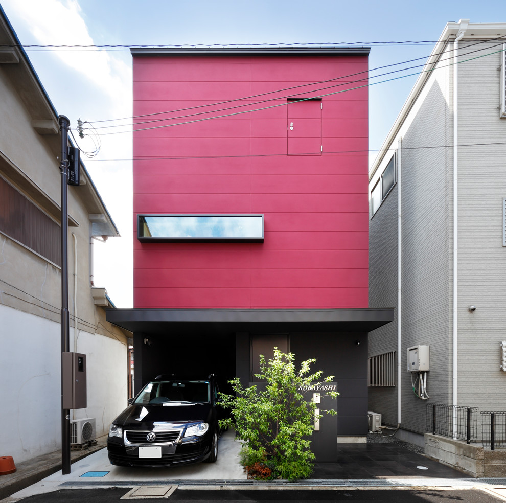 Inspiration for a contemporary three-storey red house exterior in Osaka with mixed siding, a shed roof and a metal roof.