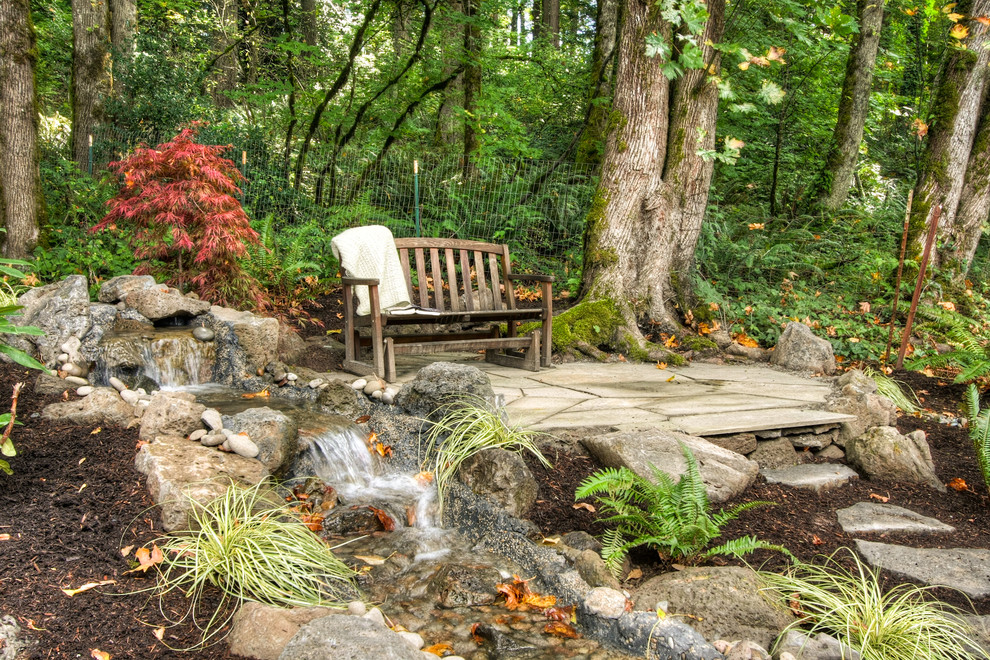 Country garden in Portland with a water feature.