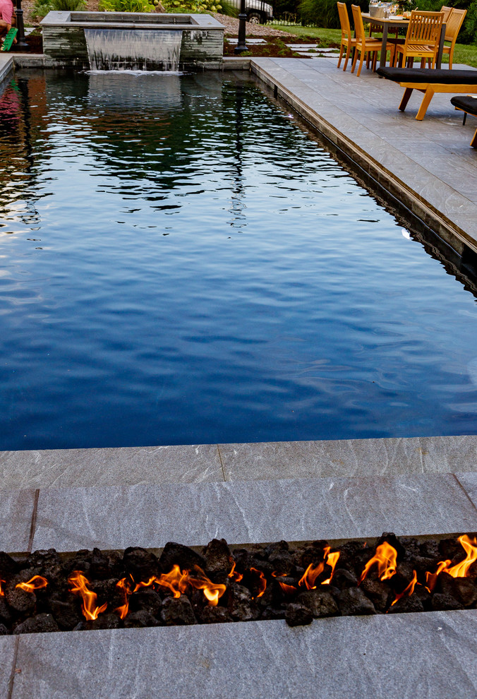 Hot tub - backyard stone and rectangular hot tub idea