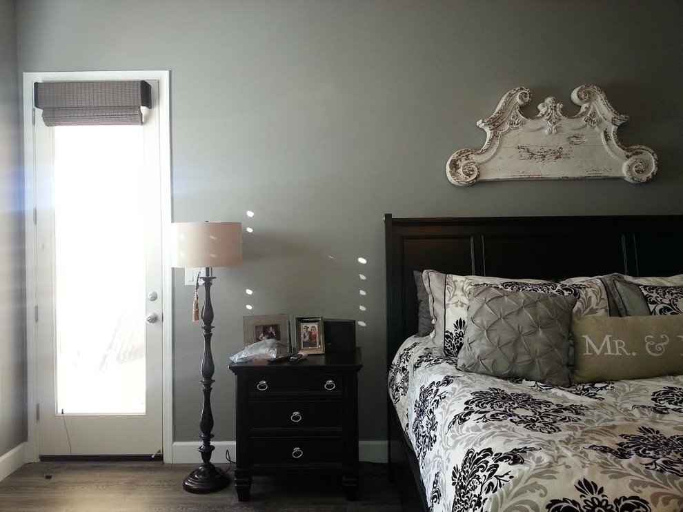 Inspiration for a mid-sized transitional master bedroom in Other with grey walls, porcelain floors and no fireplace.