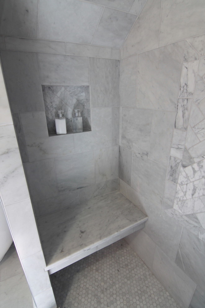 Inspiration for a small transitional master bathroom in Boston with an undermount sink, recessed-panel cabinets, white cabinets, marble benchtops, a freestanding tub, an alcove shower, a two-piece toilet, gray tile, stone tile, blue walls and marble floors.