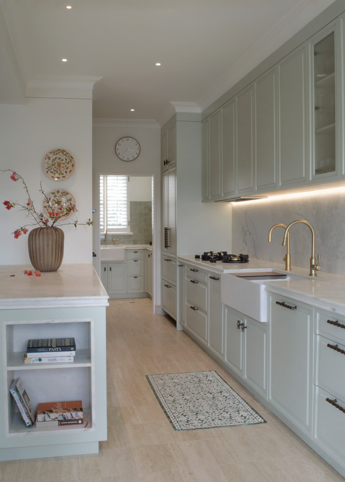 Inspiration for a large transitional galley kitchen pantry in Sydney with raised-panel cabinets, green cabinets and with island.