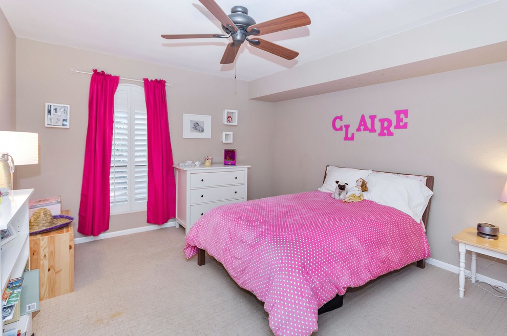 Photo of a mid-sized mediterranean kids' bedroom for kids 4-10 years old and girls in Phoenix with grey walls and carpet.