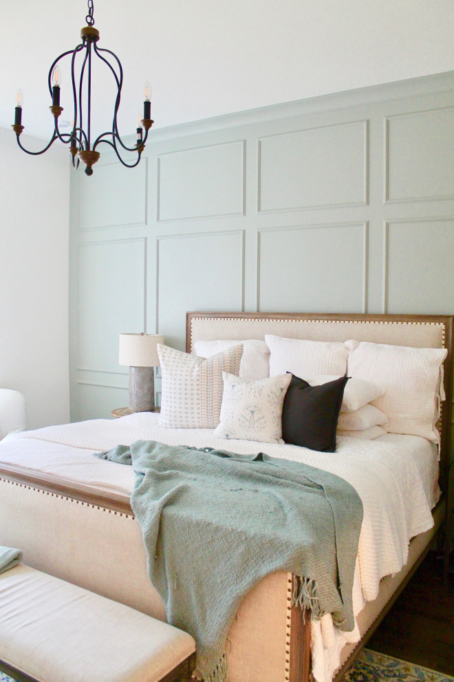 Inspiration for a mid-sized french country master dark wood floor and wainscoting bedroom remodel in Raleigh with blue walls