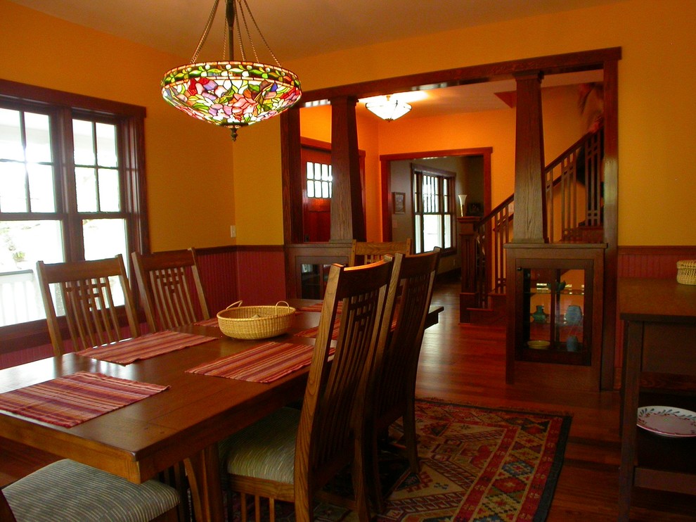 Design ideas for a large traditional separate dining room in Charleston with multi-coloured walls.