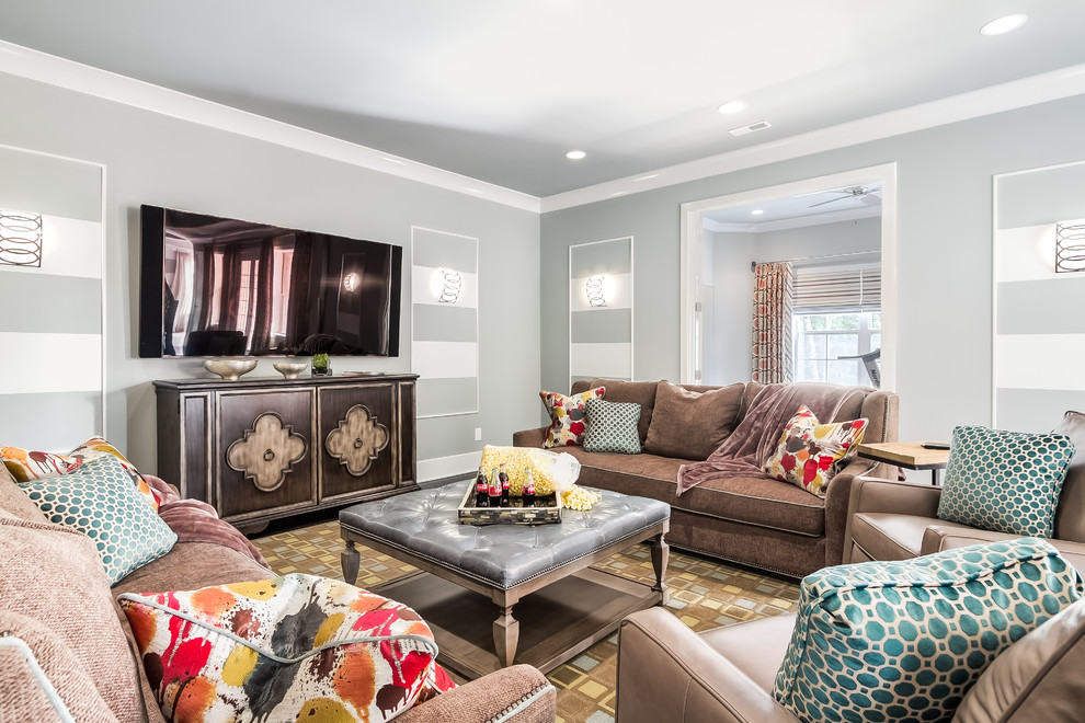 Design ideas for a transitional family room in Nashville with grey walls.