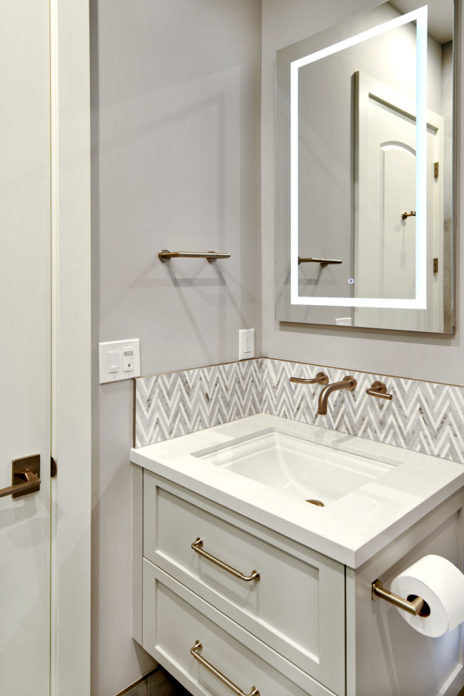 Photo of a small mediterranean bathroom in San Francisco with shaker cabinets, white cabinets, grey tiles, ceramic tiles, grey walls, a submerged sink, solid surface worktops, grey floors, white worktops, a single sink and a floating vanity unit.