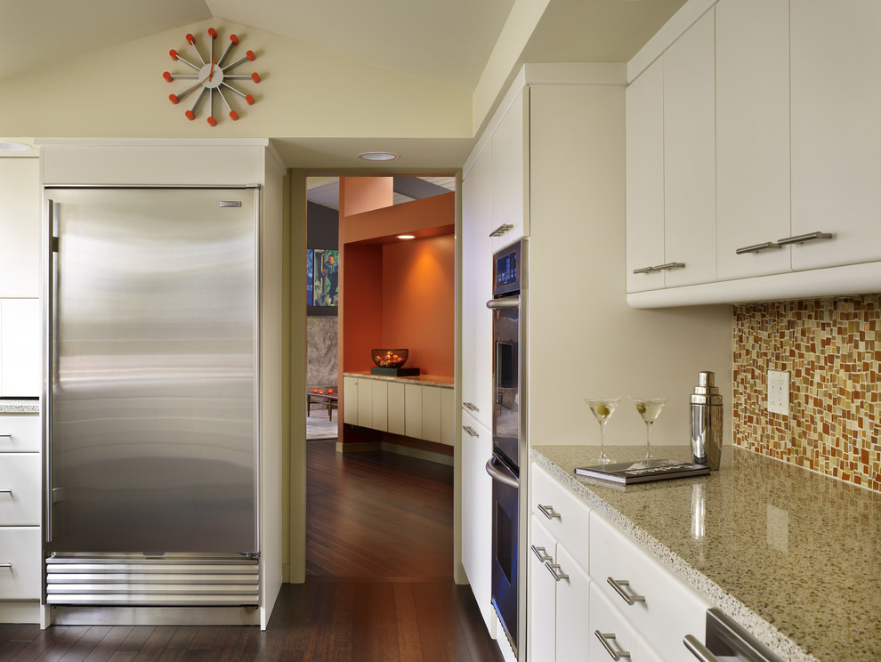 Inspiration for a midcentury kitchen in Seattle with stainless steel appliances.