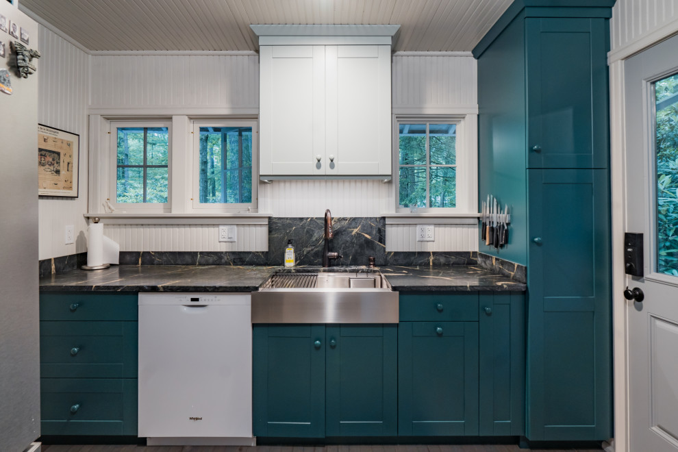 Inspiration for a small country galley eat-in kitchen in Other with an undermount sink, shaker cabinets, green cabinets, soapstone benchtops, black splashback, light hardwood floors, no island, beige floor, black benchtop and wood.