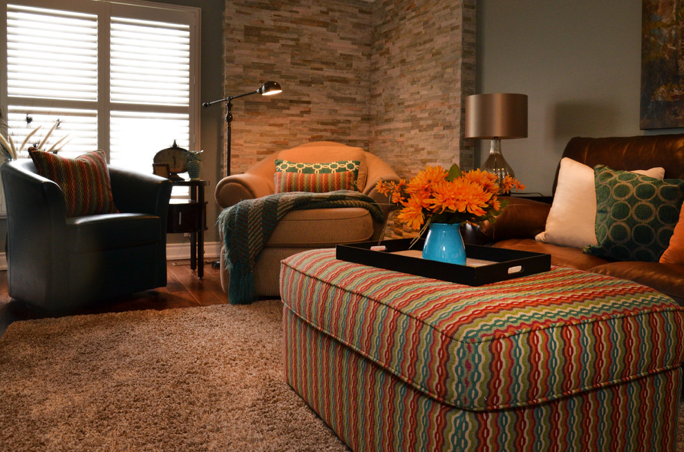 Example of a transitional home design design in Toronto