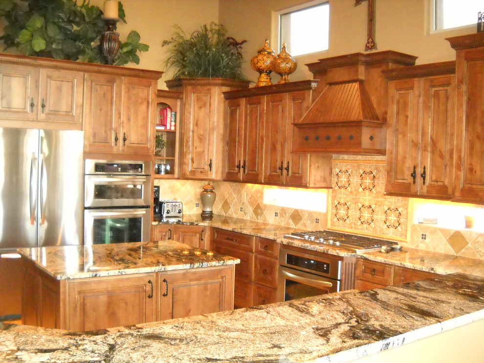 Example of a tuscan kitchen design in Phoenix