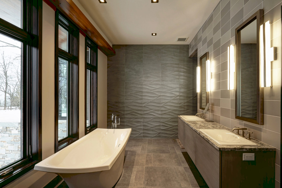 Large trendy master ceramic tile double-sink bathroom photo in Milwaukee with a bidet, a drop-in sink, granite countertops, gray countertops and a floating vanity
