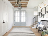 Farmhouse Entry by Sustainable Nine Design + Build