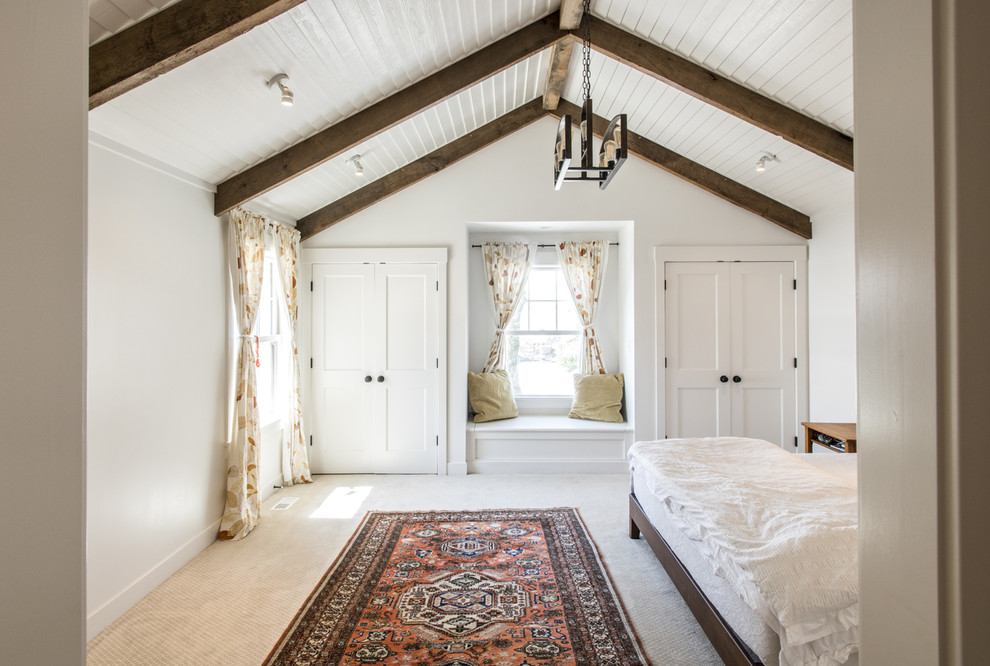 Photo of a mid-sized country master bedroom in Louisville with white walls, carpet and beige floor.