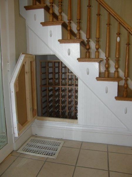 Large arts and crafts wine cellar in Minneapolis with storage racks.
