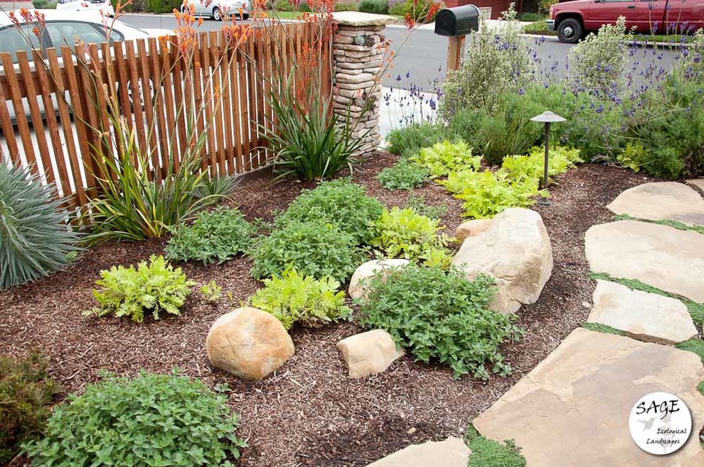 Design ideas for a mid-sized asian backyard garden in San Luis Obispo with concrete pavers.