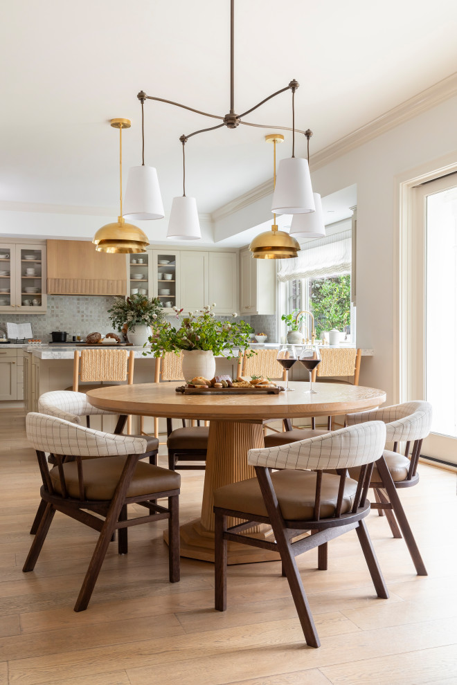 Example of a transitional dining room design in Orange County