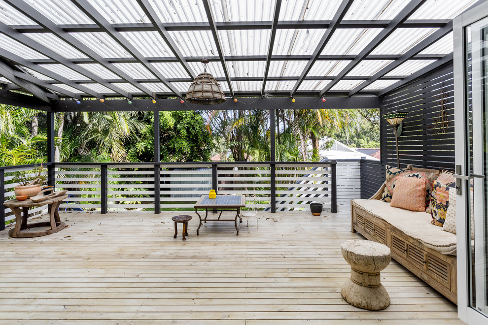 This is an example of a large mediterranean rooftop and rooftop deck in Sunshine Coast with an awning.