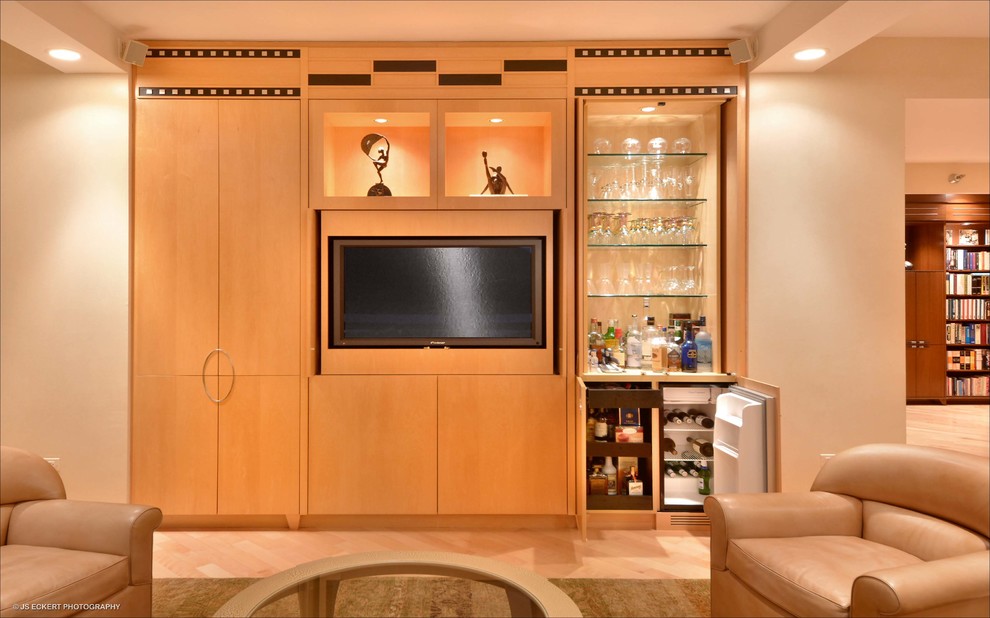 Design ideas for a small contemporary single-wall wet bar in Chicago with no sink, flat-panel cabinets, light wood cabinets, light hardwood floors and brown floor.