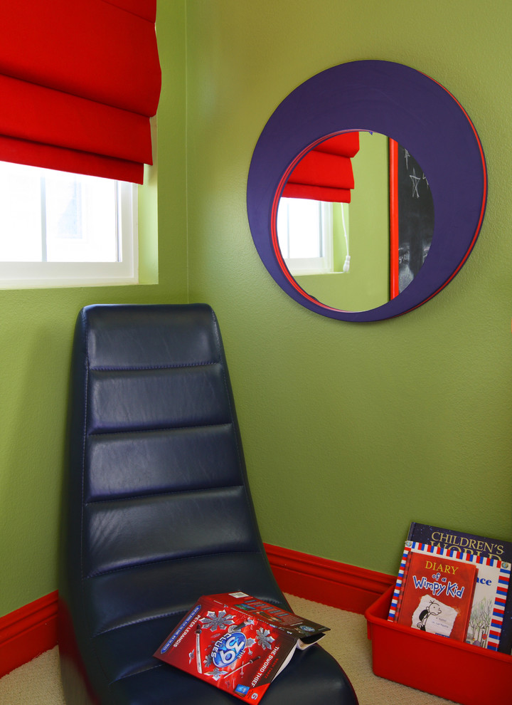 This is an example of a contemporary kids' room in Orange County with green walls.