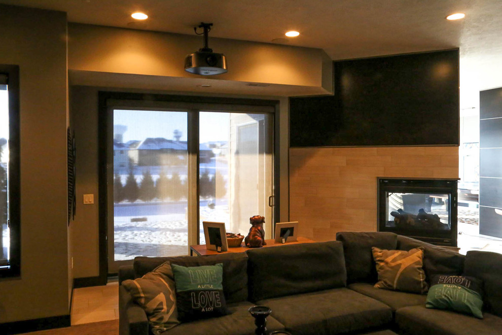 Home design - large transitional open concept carpeted and beige floor home design idea with beige walls and a wall-mounted tv