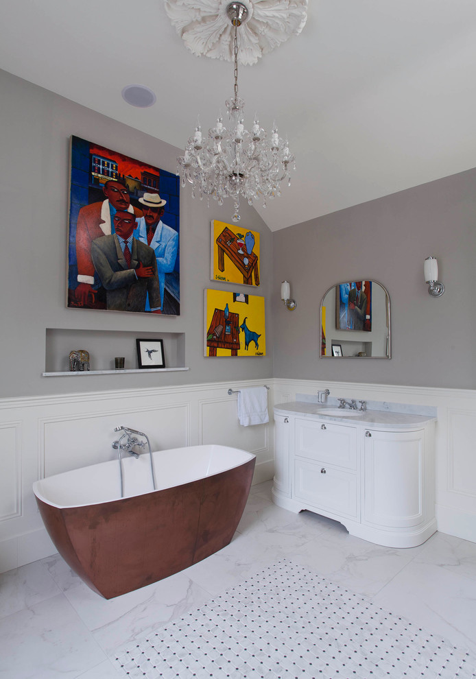 Inspiration for a large eclectic kids bathroom in Belfast with furniture-like cabinets, white cabinets, a freestanding tub, a curbless shower, white tile, porcelain tile, grey walls, marble benchtops, marble floors and an undermount sink.