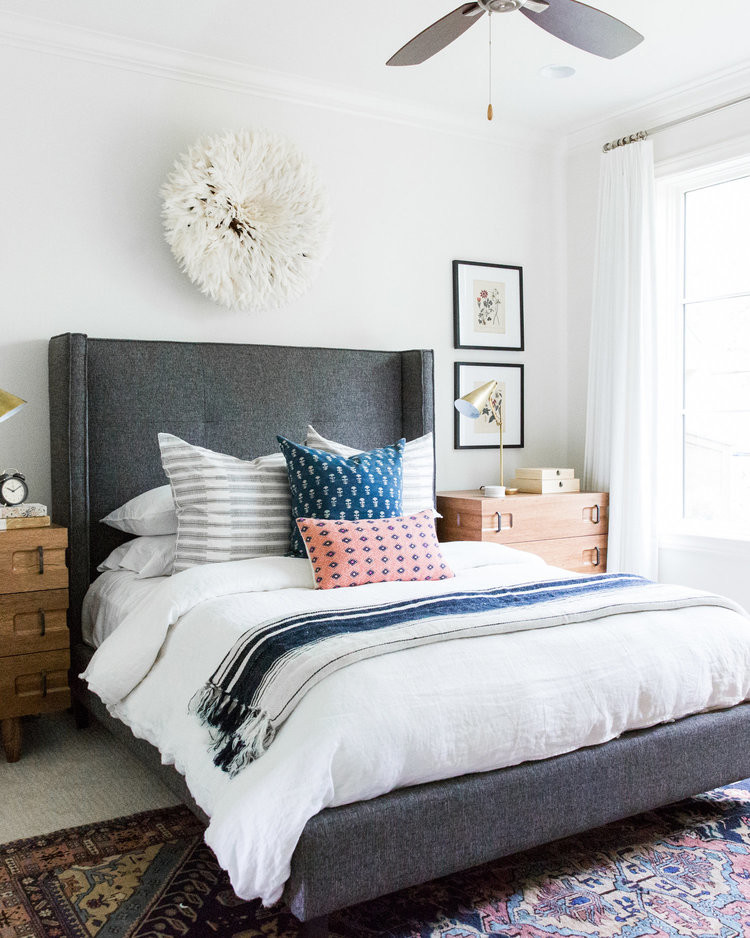 Inspiration for a mid-sized beach style guest bedroom in Salt Lake City with white walls, carpet and beige floor.