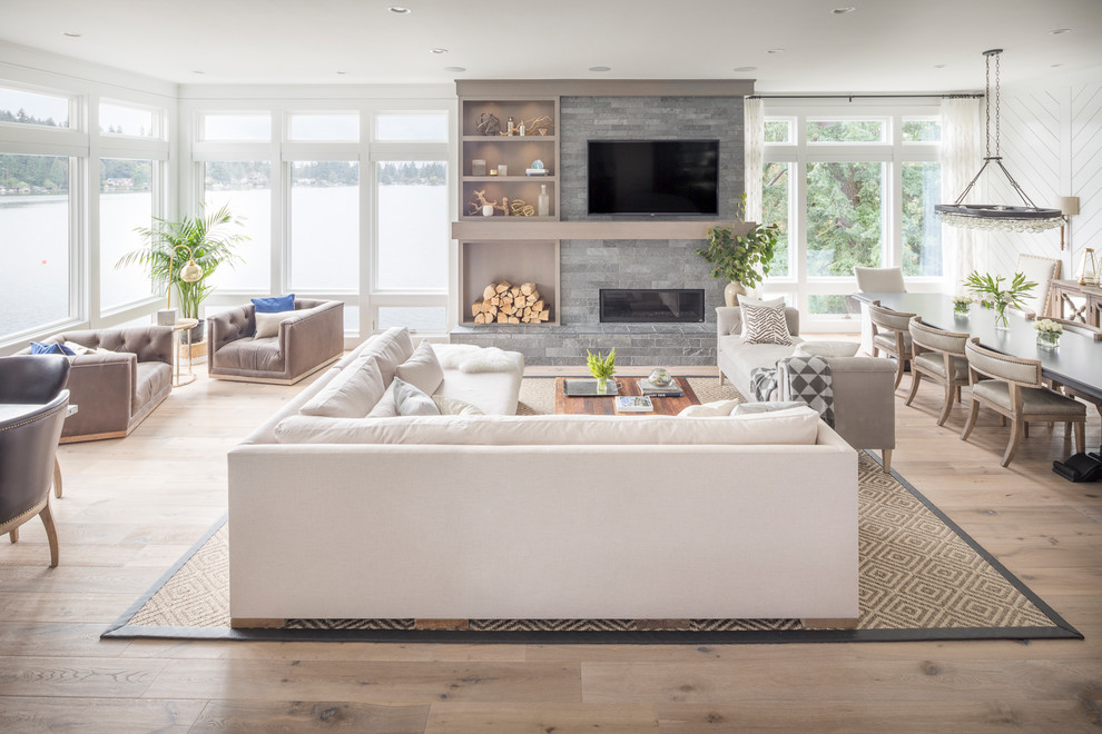 Photo of a transitional living room in Portland with beige floor.