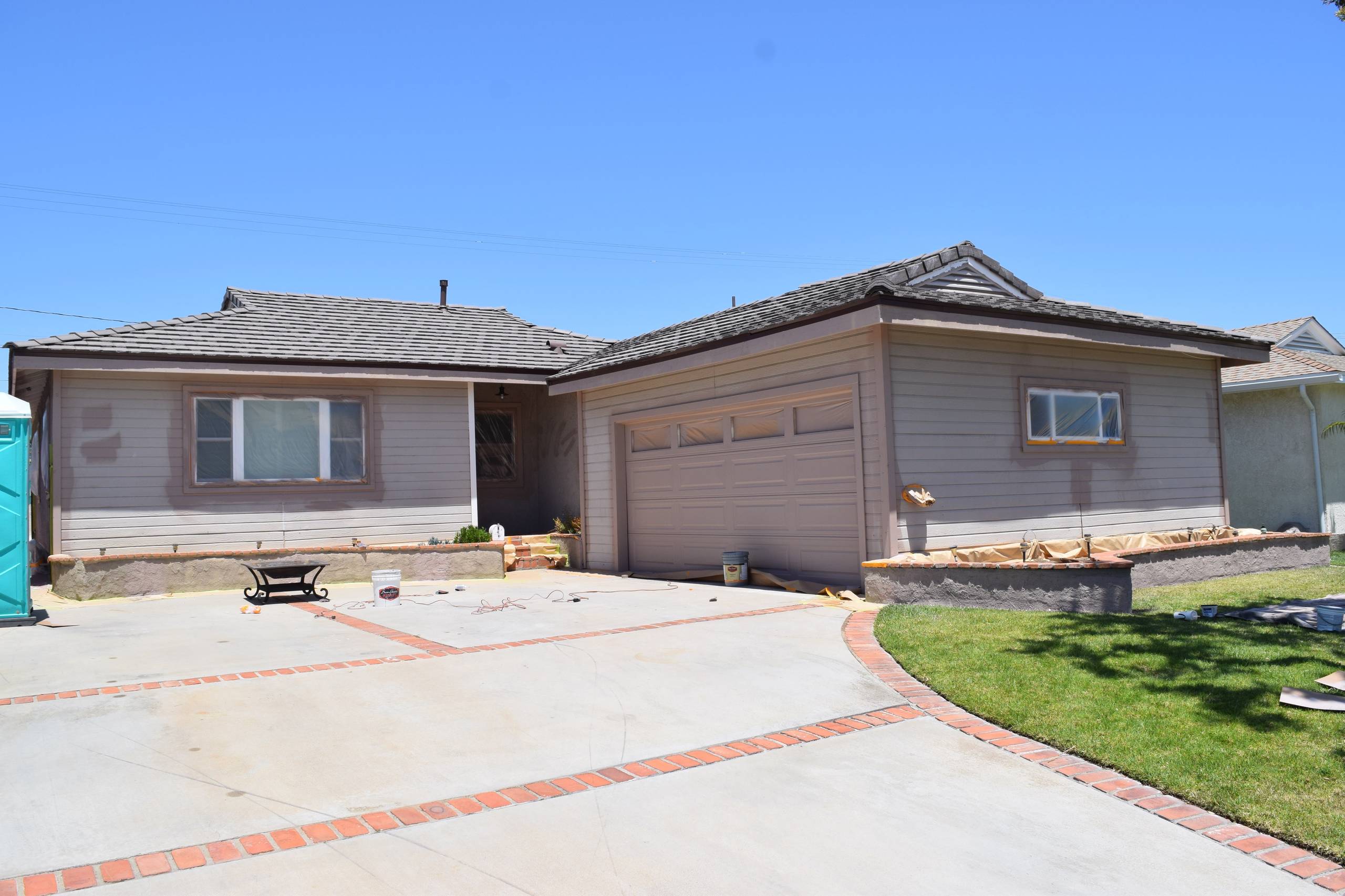 Beautiful White & Brown Exterior Home-Before