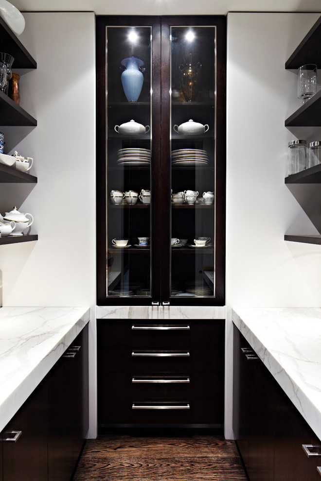 Contemporary galley separate kitchen in Melbourne with flat-panel cabinets, dark wood cabinets, marble benchtops, stone slab splashback and with island.