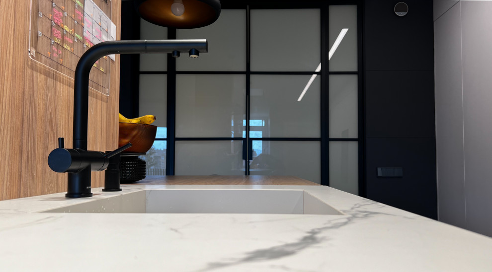Cocina integrada a Salón en Igualada