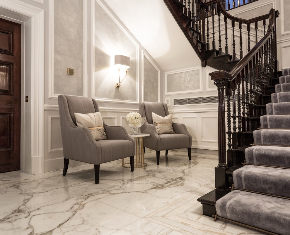 Design ideas for a large country hallway in London with grey walls and marble floors.